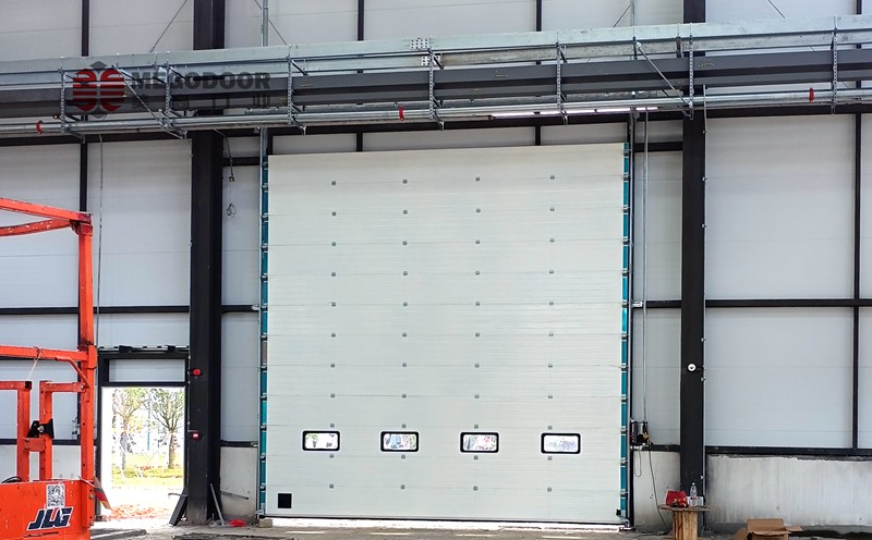 淮安电子器械厂房电动提升门——静音、安全、节能插图